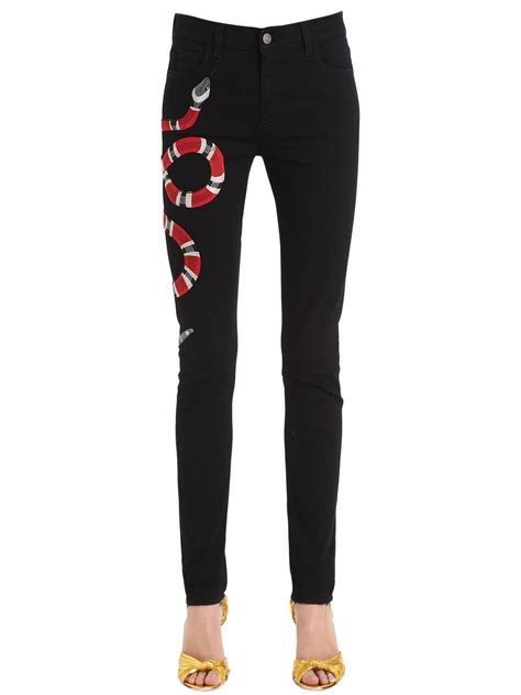 womens gucci jeans sale|Gucci snake embroidered jeans.